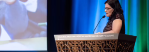 NCSD Director Gina Chirichigno speaking at NCSD's Brown @ 70 event at the National Museum of African American History and Culture in May 2024.